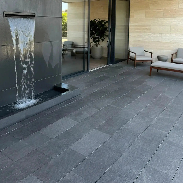 Super Black basalt pool deck and copings in Woustviller