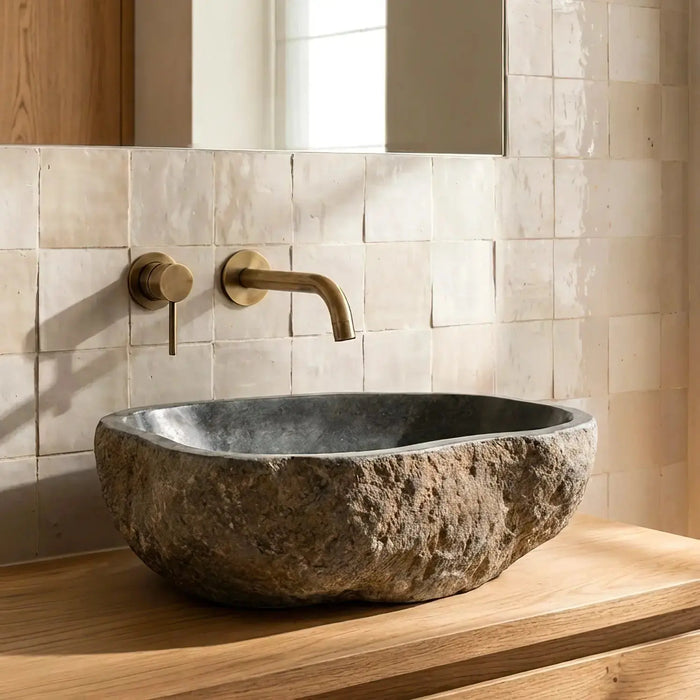 Bathroom with a river pebble basin in Schiltigheim